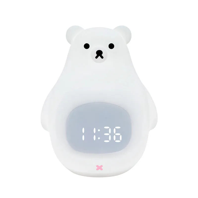 Big White Bear shaped silicone night light with remote control on a bedside table.