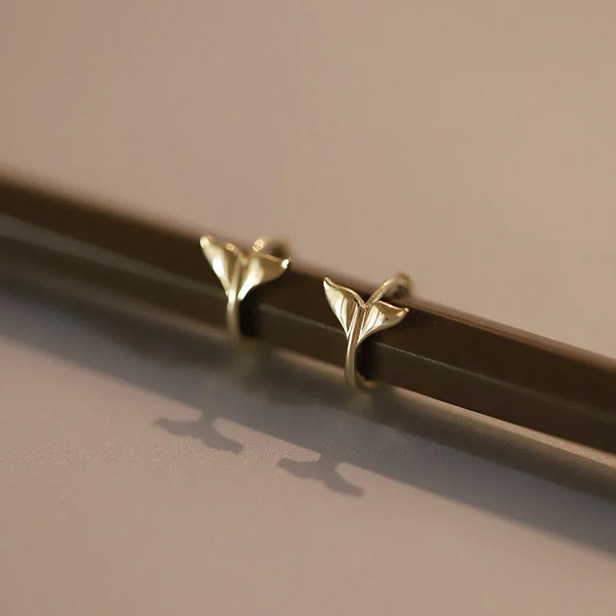 S925 sterling silver fishtail earrings with 14k gold plating in gold and white gold colours