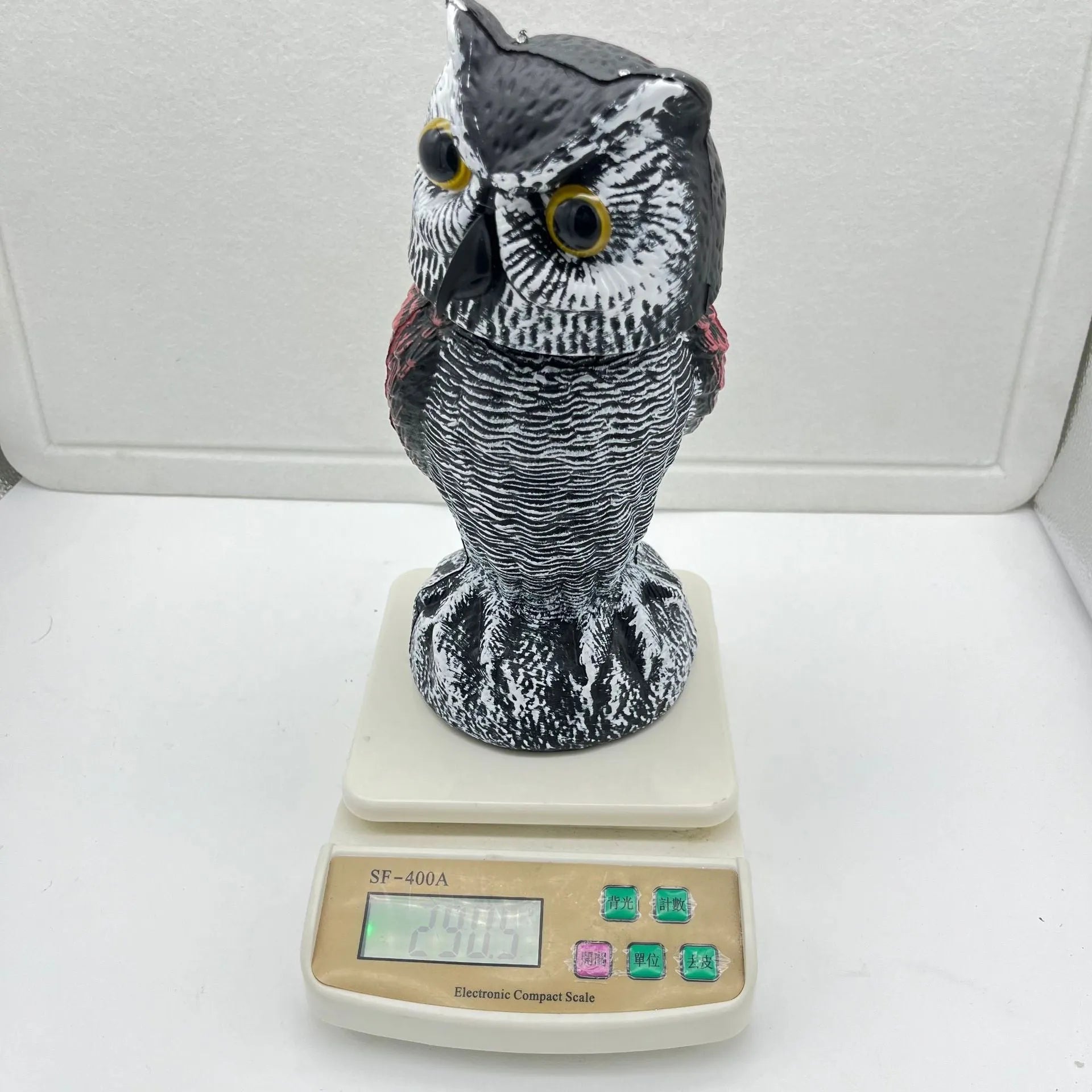 Artificial owl bait ornament with shaking head, made from white PE plastic, showing round ear design.
