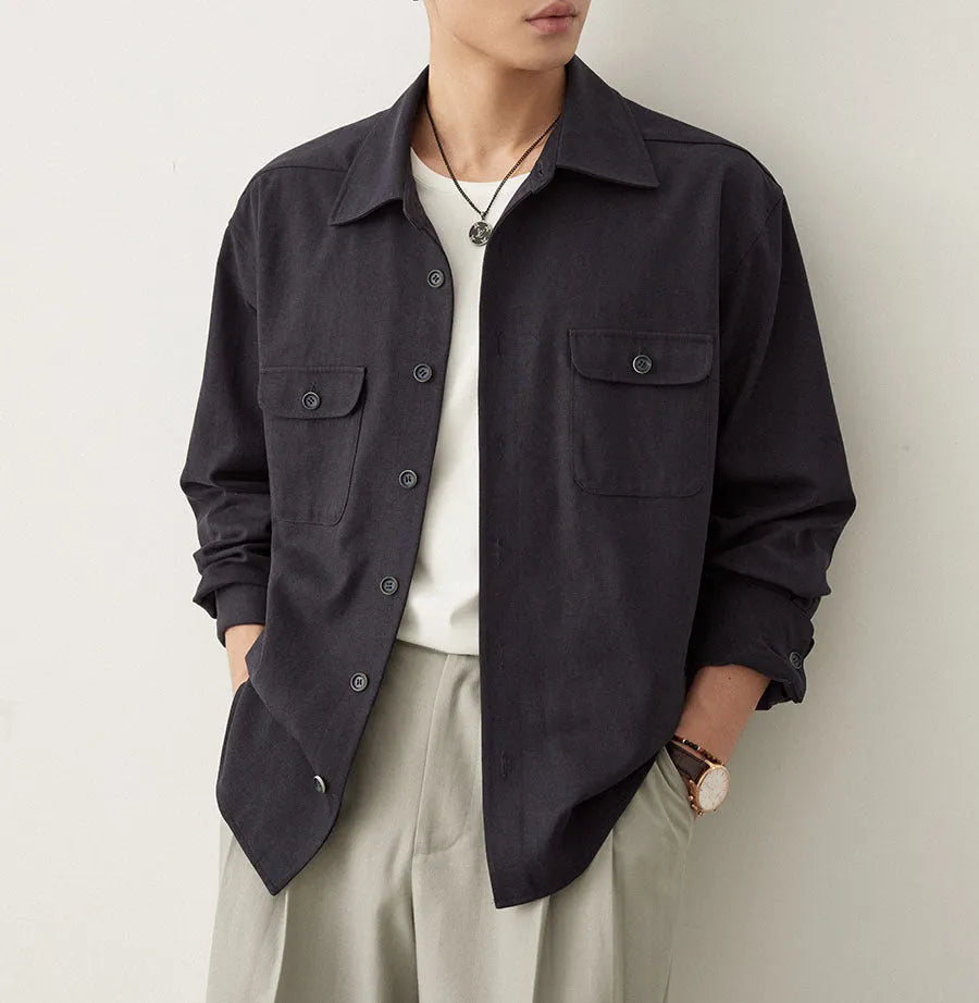 Men's cotton fabric lapel shirt in light sand rice colour on a hanger