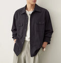 Men's cotton fabric lapel shirt in light sand rice colour on a hanger