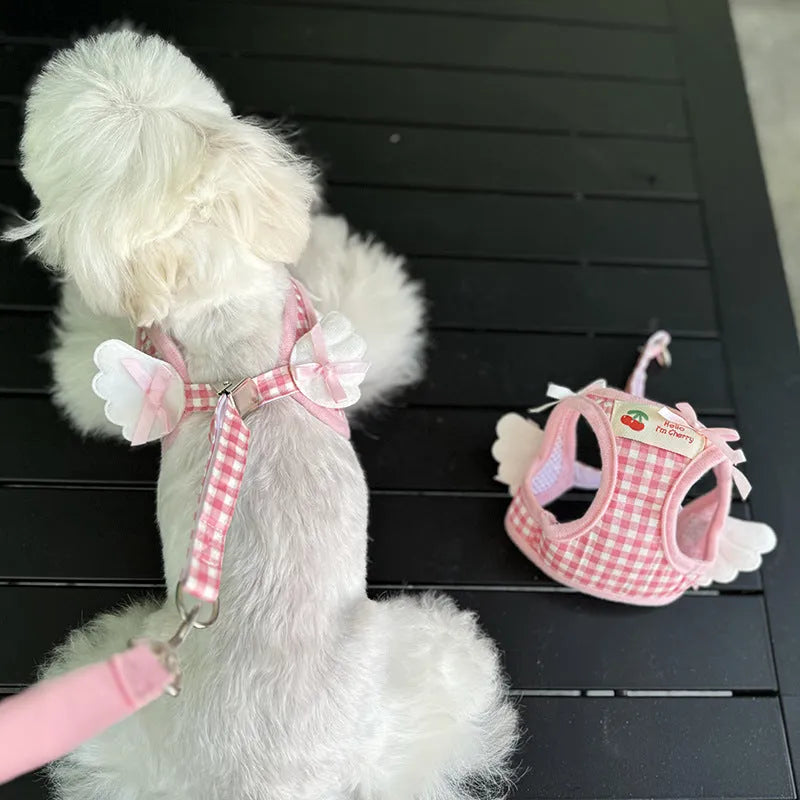 Pink and black cotton chest-back hand holding rope harness for small dogs.