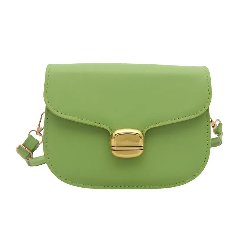 Simple PU handbag for women in one of six colours, showing interior with zippered change purse and phone pocket.