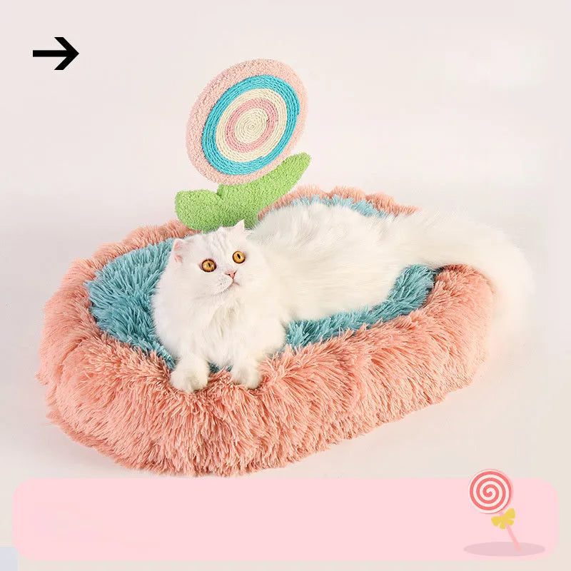 Pink thick plush elliptical cat bed with a deep, lollipop-shaped nest for cats.