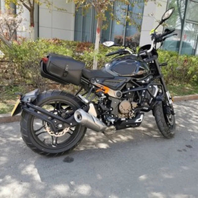 Black PU leather motorcycle swingarm saddlebag mounted on Sportster showing 30cm length dimensions