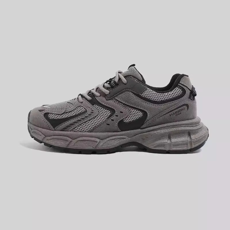Men's gray platform casual sneakers with PU mesh upper and leather stitching details on a white background.