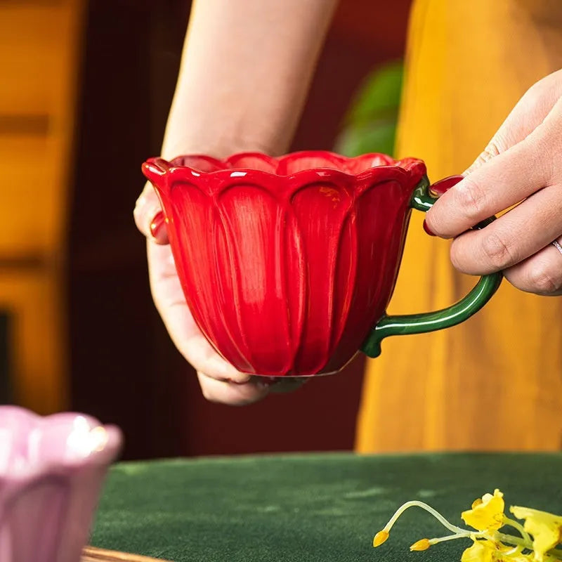 Ceramic breakfast cup with floral pattern, 500ml capacity, in red and purple colours.