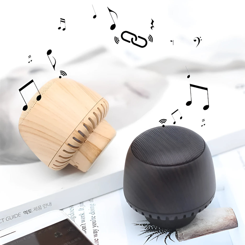 Portable mushroom-shaped Bluetooth speaker with LED night light, compact 55mm cube, in black colour