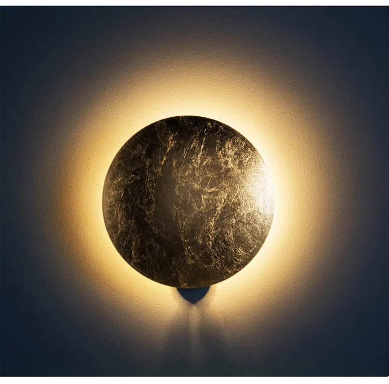 Modern minimalist aluminium bedside lamp in gold finish with 20cm or 25cm diameter options