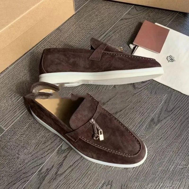 Black high-top slip-on loafers with a round toe and visible sewing line detail on the artificial PU upper.