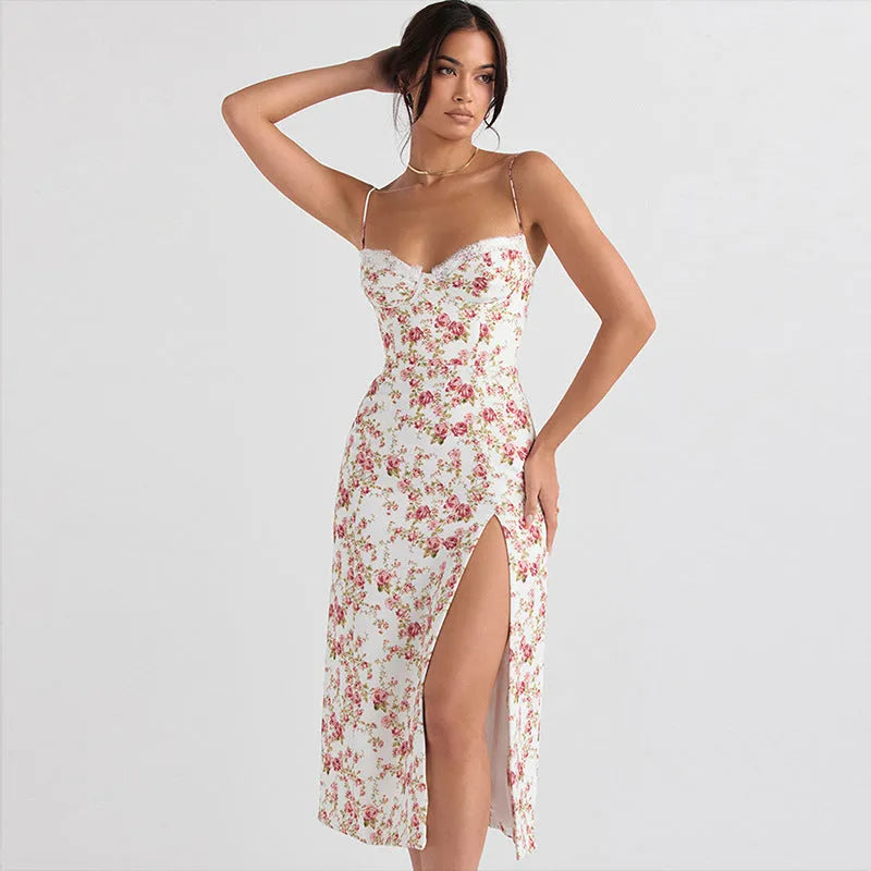 Blue long dress with white lace flower print, featuring a thigh slit and thin suspender straps.