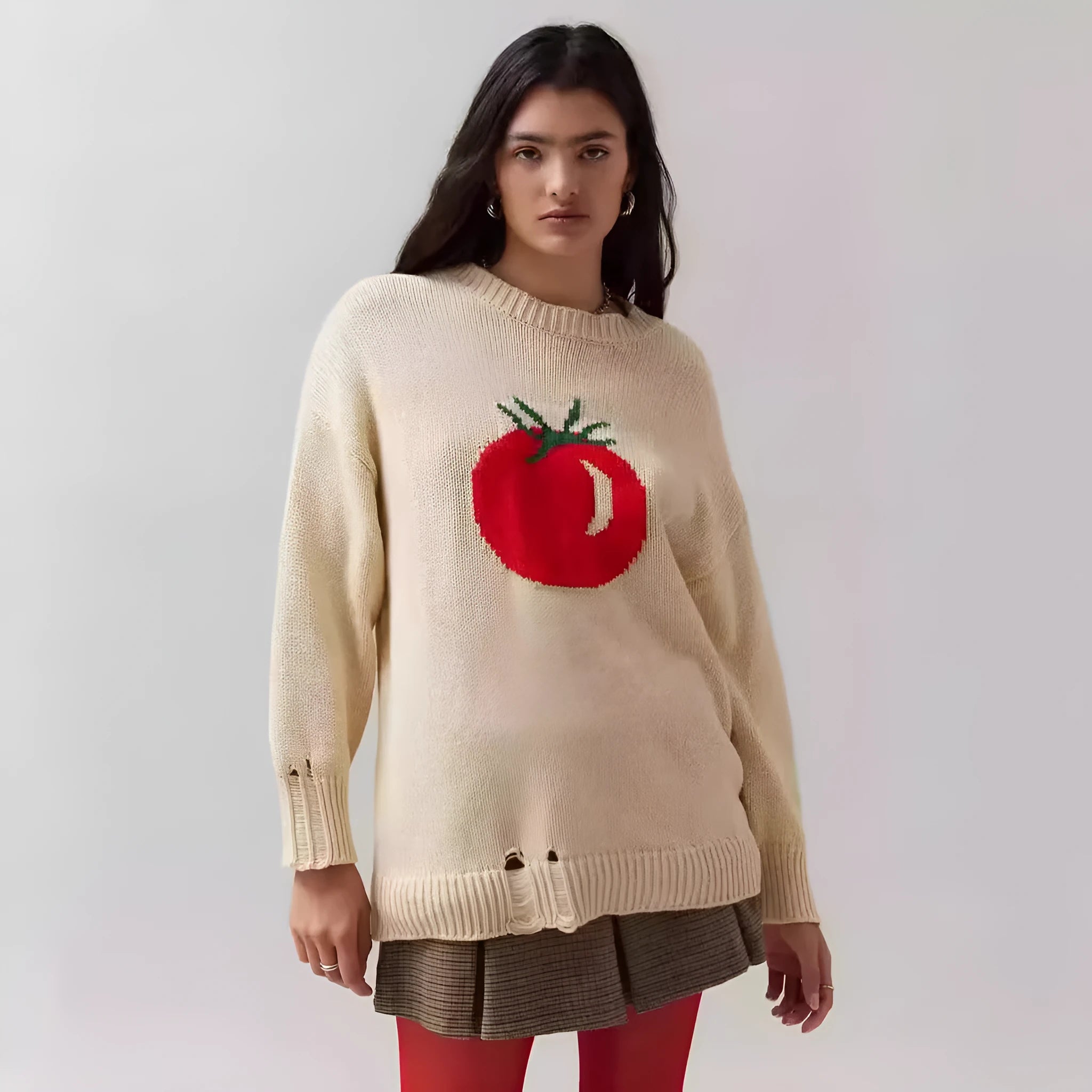 Women's loose-fitting acrylic sweater with round neck, long sleeves, and Jacquard craft in beige.