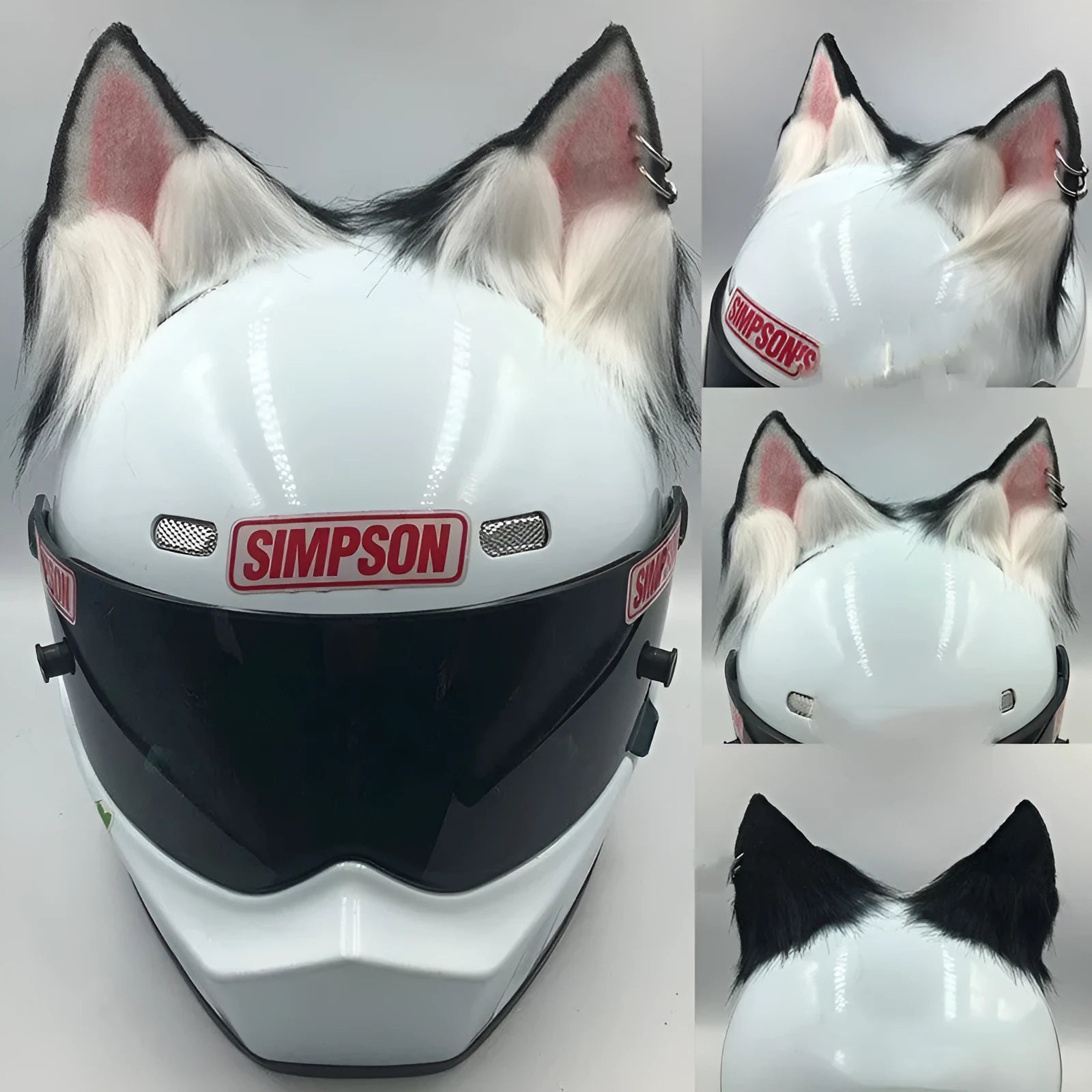 Set of black and white wolf ear and tail ornaments clipped to a motorcycle helmet