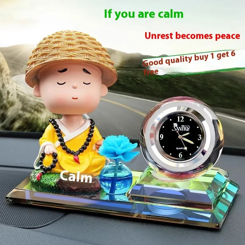 Glass car perfume ornament with crystal carving, cartoon style, in blue or red, including clock, apple, and shaking head monk designs.