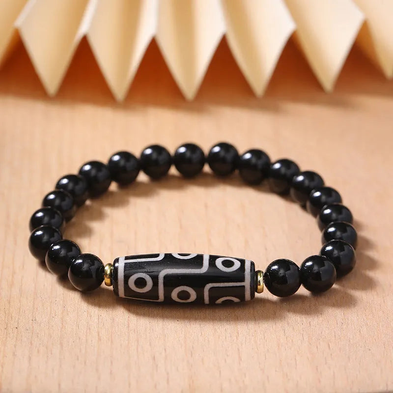 Tibetan Dzi bead bracelet made from obsidian agate with traditional ethnic patterns for unisex couple wear