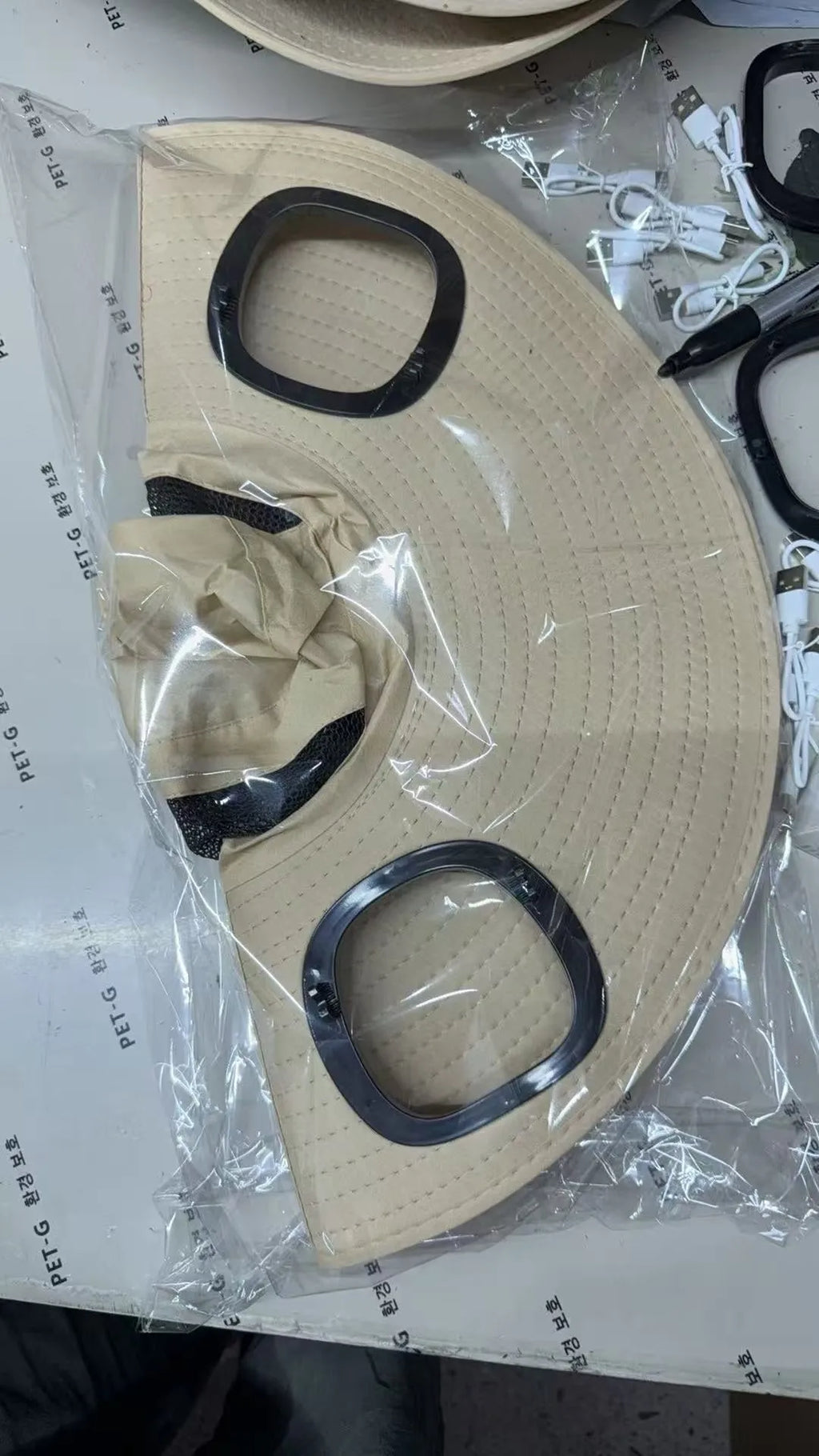 Men's grey large eave cap with integrated solar fan on crown for outdoor sun protection and cooling.