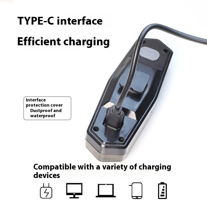 Wireless remote control bicycle taillight with charging cable on black background