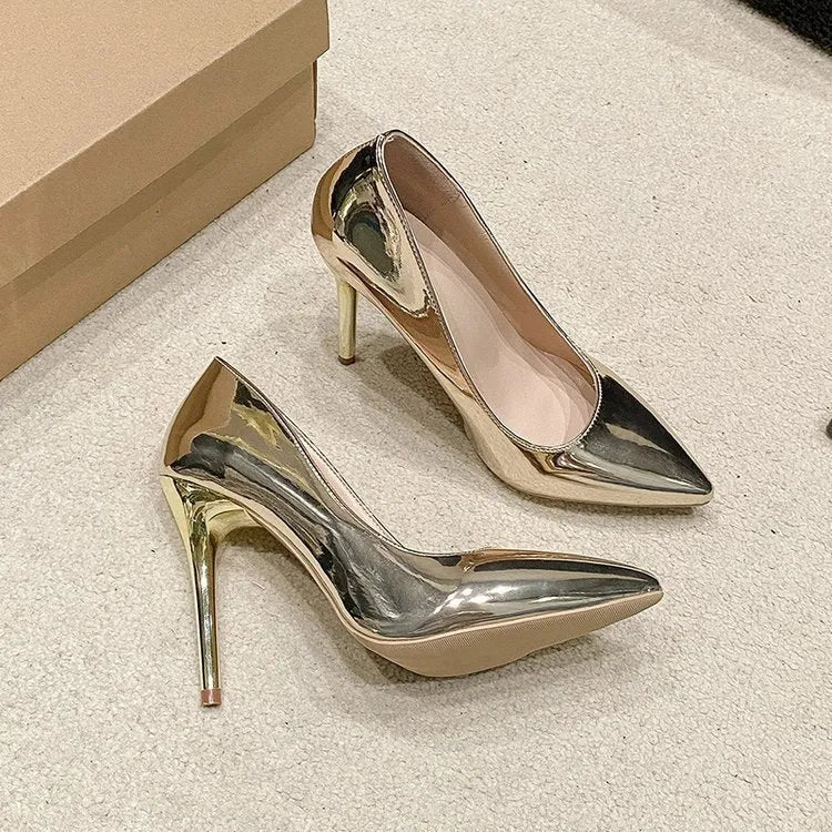 Gold pointed toe stiletto heel pump with low-cut PU leather upper