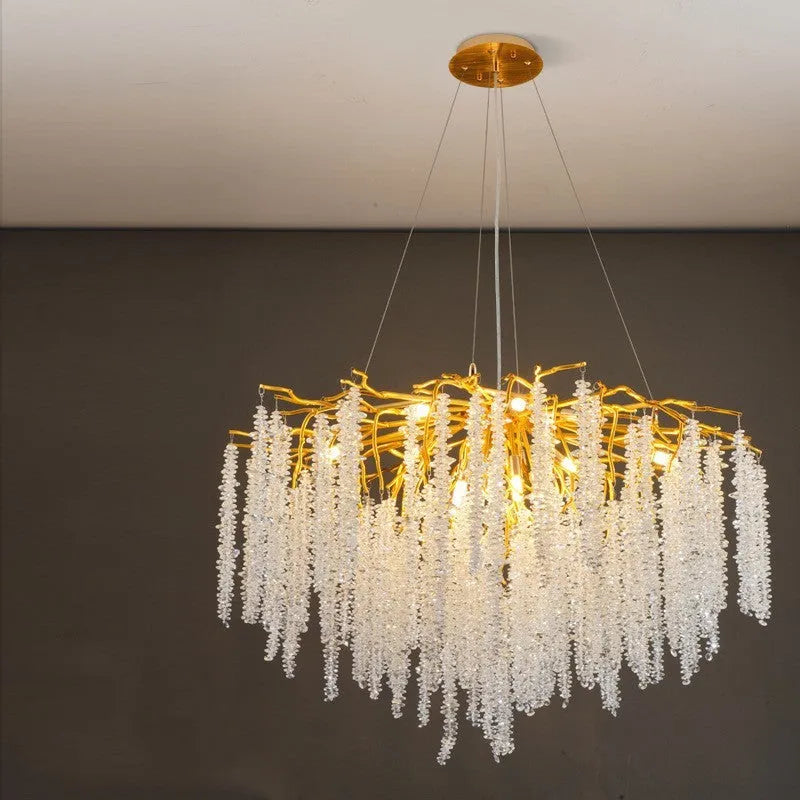 Aluminium alloy crystal chandelier light with adjustable drop, shown in round and long style options.