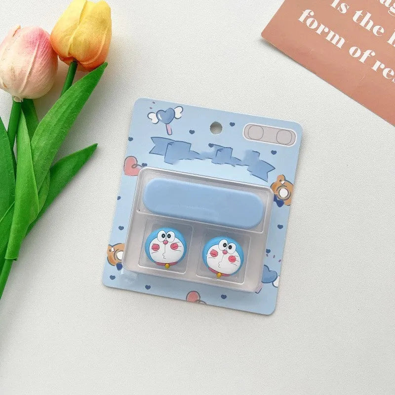 Plastic cartoon-style magnetic data cable fixer clip on a desktop