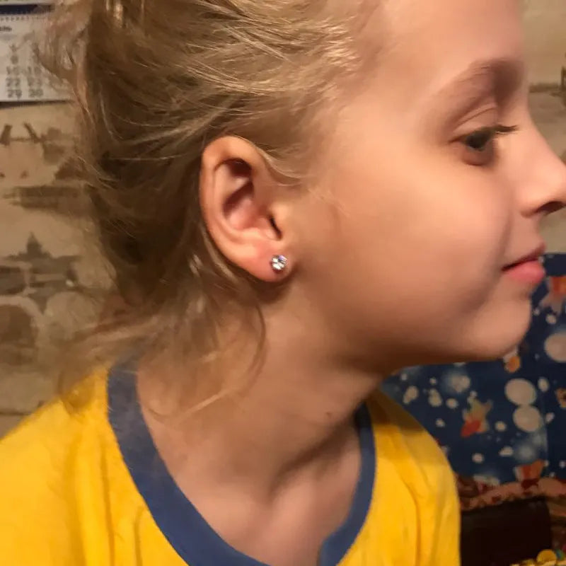 Disposable ear piercing gun with gold lavender zircon crown stud earring made from 316L stainless steel