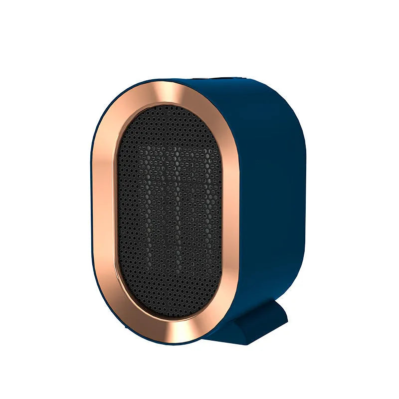 Compact black desktop electric fan heater with a front grille and mechanical control dials.