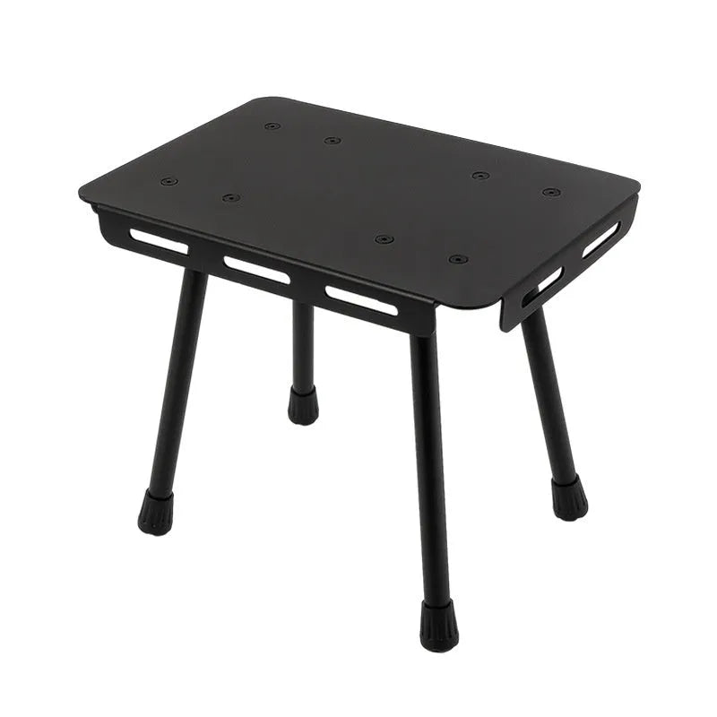 CLS aluminium dual-use folding camping stool converted into a small table next to its storage bag.