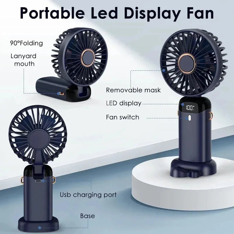 Blue portable handheld fan showing foldable design with digital battery display and removable grill