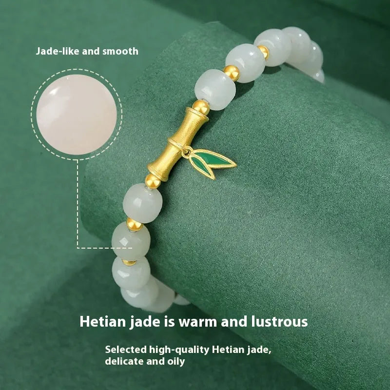 S925 sterling silver bracelet with Hetian jade beads and bamboo leaf charms in gold colour
