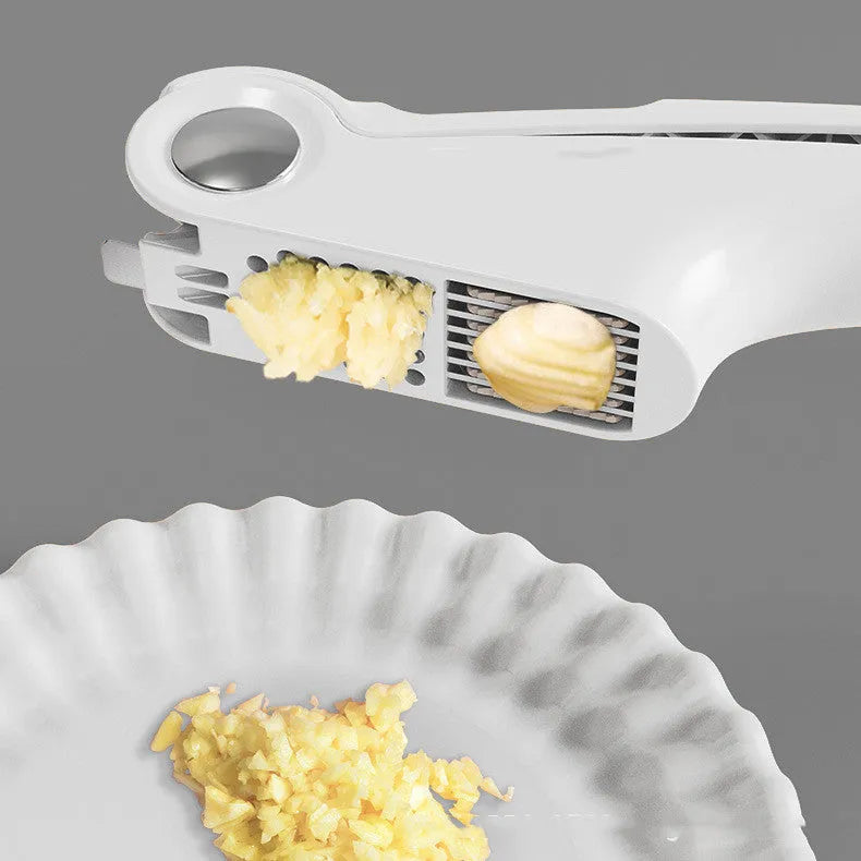 Manual garlic press kitchen gadget with ABS handle and stainless steel in white green orange colours