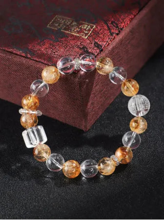 Handmade Huang Tajing beaded bracelet with freshwater pearl, yellow crystal, and white crystal beads