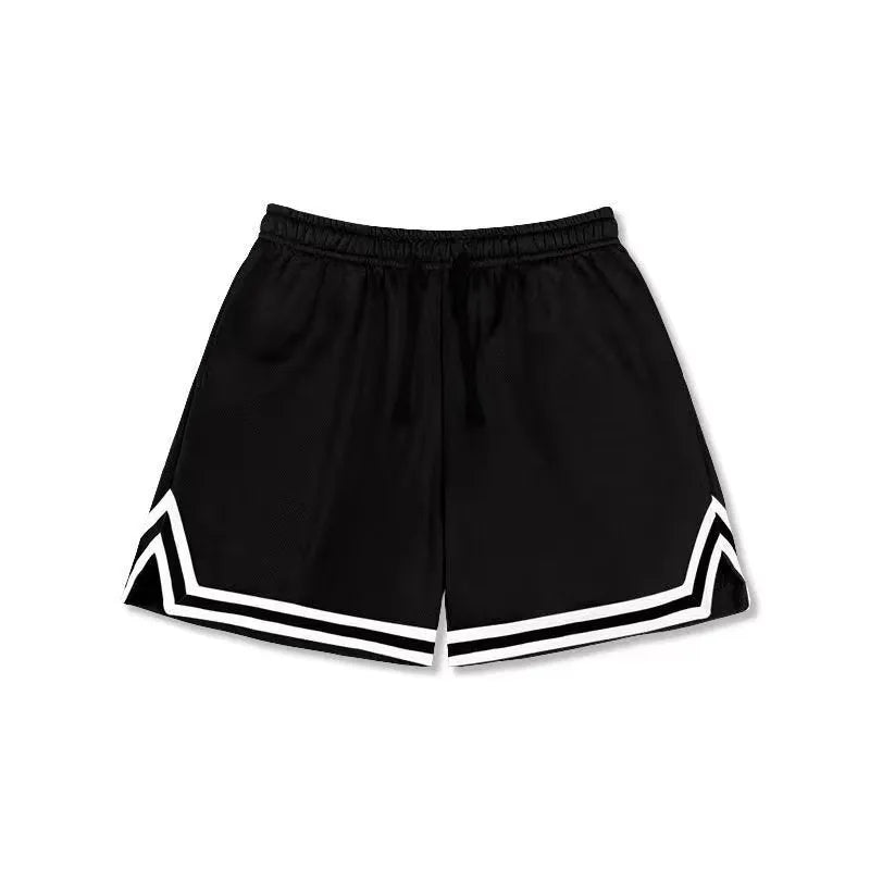 Man wearing loose-fit apricot coloured polyester sports shorts with an elastic waistband.