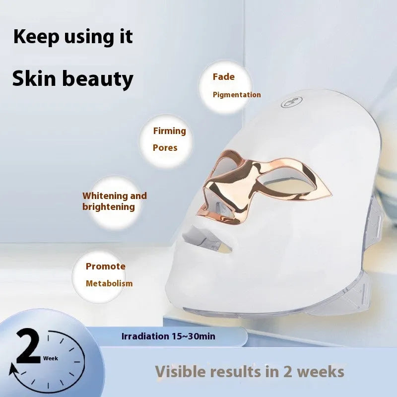 Rechargeable manual touch LED beauty mask in black with golden edge, showing facial light therapy device