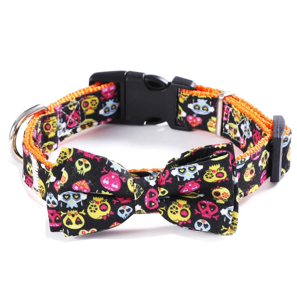 Cat collar with geometric pattern in black ghost, yellow pumpkin, and black skull colours, made from polyester, available in sizes XS to L.