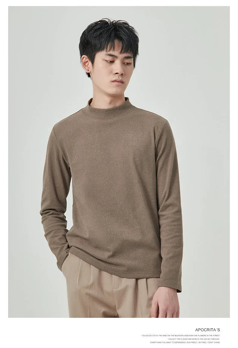 Men's brown Dralon fabric long sleeve t-shirt with a half-high collar and pullover style.