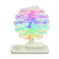 Spiral tree geometric LED table lamp with white lighting on wooden surface