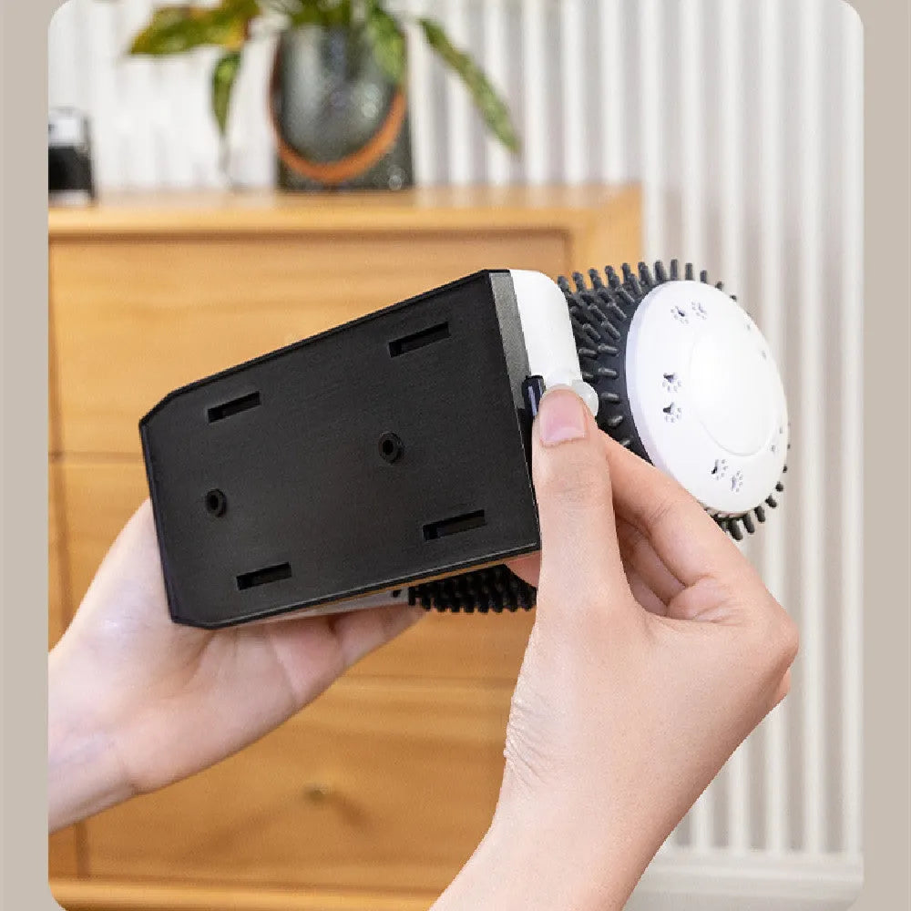 White automatic cat self-groomer mounted on wall corner with USB cable connection