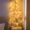 Flexible LED butterfly tree lamp with colourful ornaments on 1.8 metre rattan vines