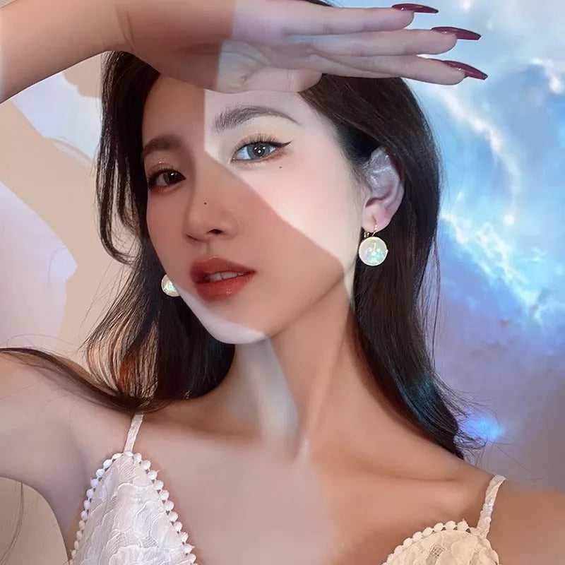 Colourful geometric Korean style metal clip-on earrings with mermaid pearl design and anti-lost clip.