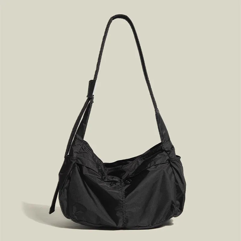 Nylon waterproof messenger bag in horizontal square shape with shoulder strap