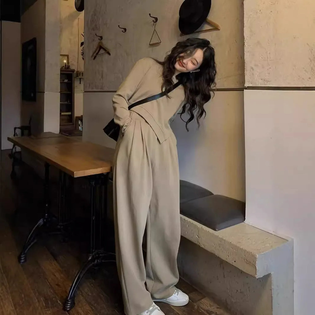 Women's khaki loose-fit polyester casual sports suit set with long sleeves and trousers.