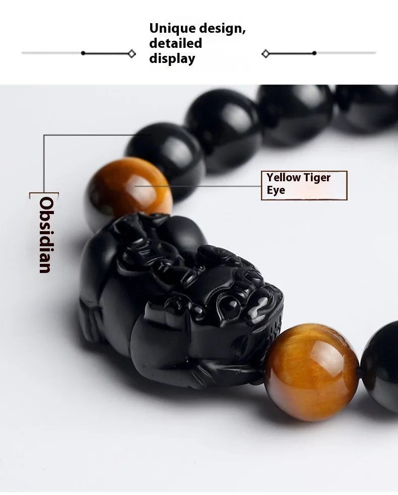 Black obsidian crystal Pi Xiu bracelet with ethnic styling and spiritual symbolism