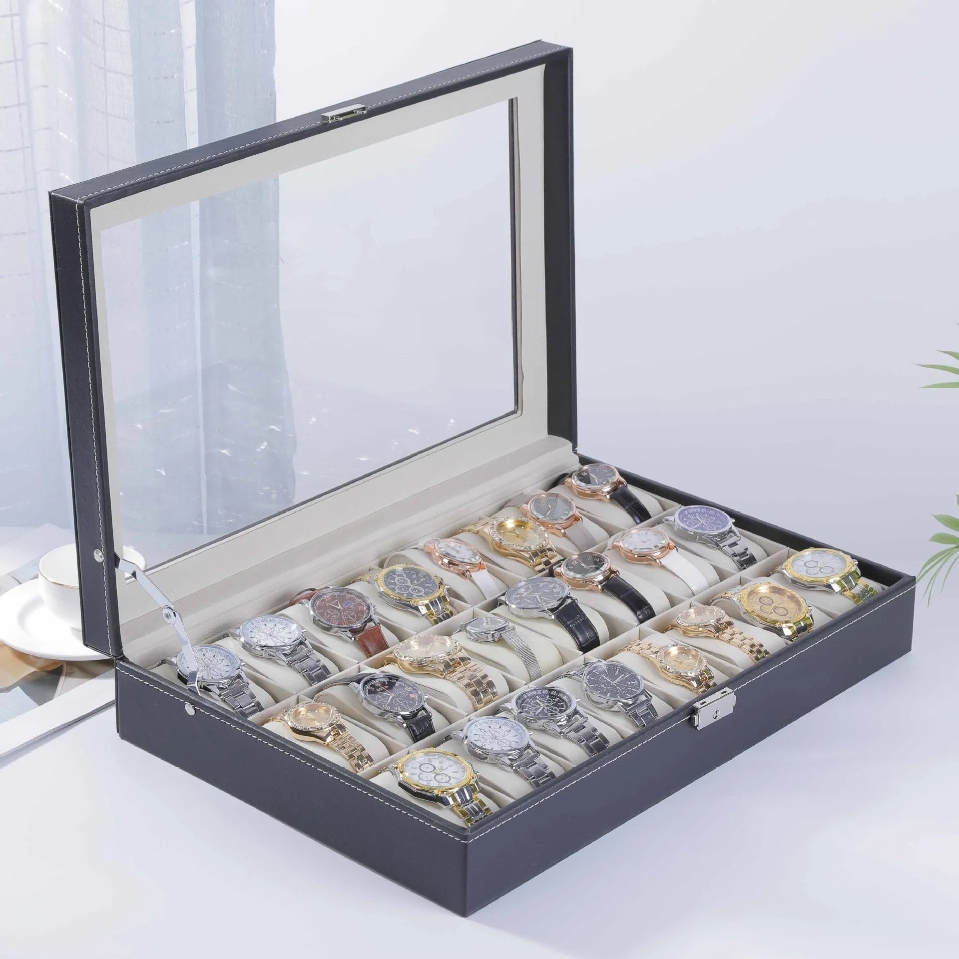 Grey high-grade leather watch storage box with see-through lid showing multiple watch slots.