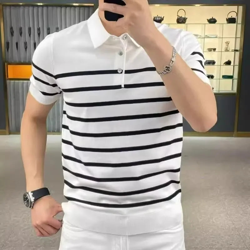Black and white striped knitted pullover t-shirt with a lapel collar, laid flat.