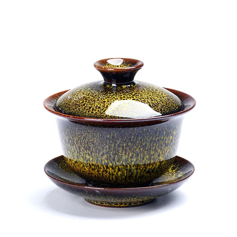Three-piece ceramic tea set with covered bowl and teacup in black transmutation glaze finish