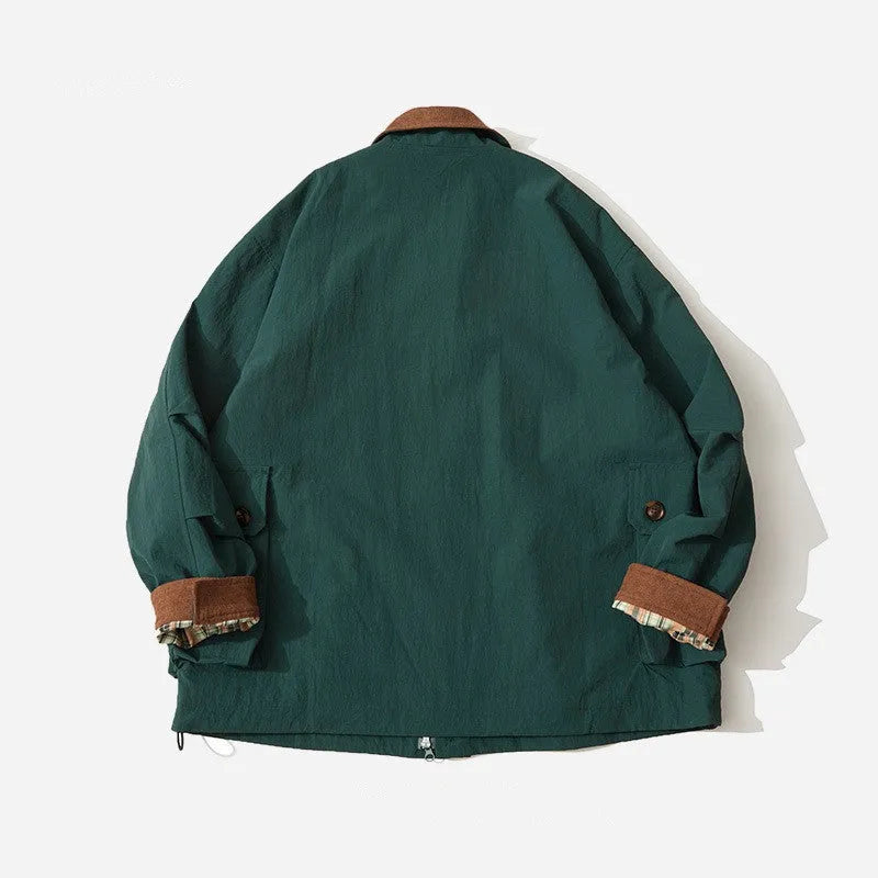 Green casual jacket with long sleeves and side seam pockets on a hanger