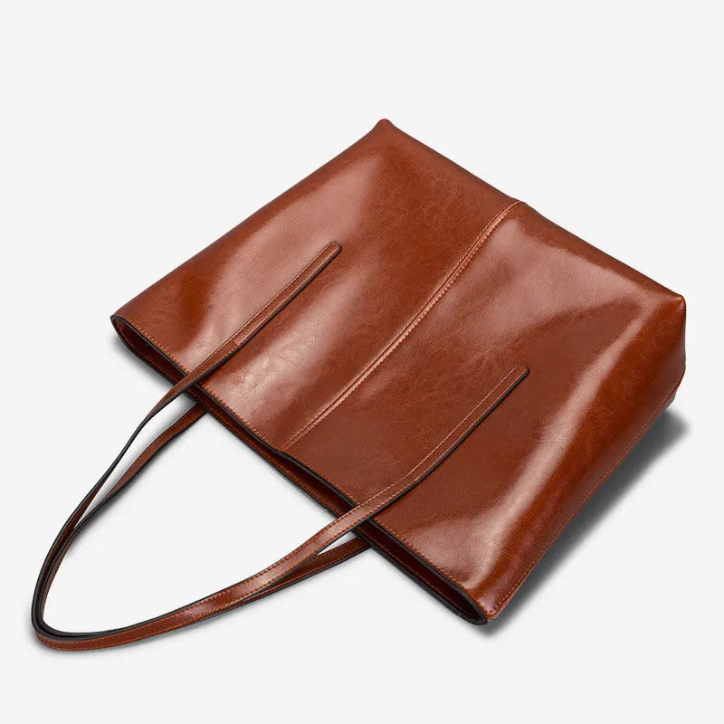 Women's genuine leather shoulder bag with retro styling and multiple internal compartments