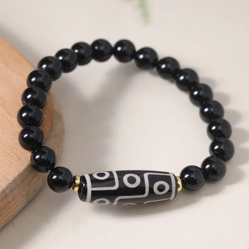 Tibetan Dzi bead bracelet made from obsidian agate with traditional ethnic patterns for unisex couple wear
