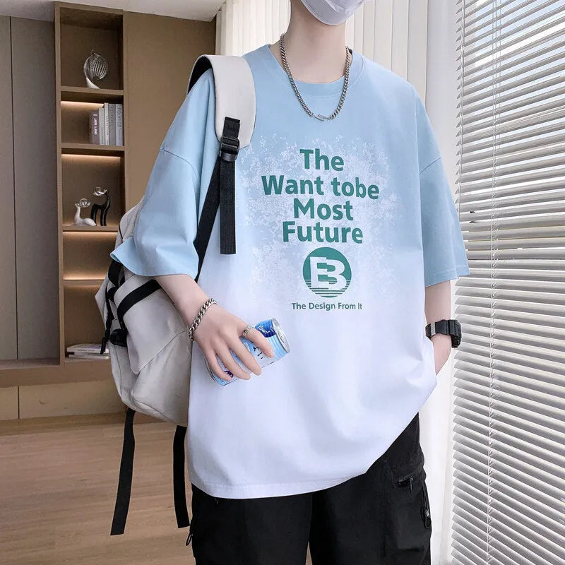 Boy wearing a dark blue youth T-shirt with a printed text pattern and drop-shoulder sleeves