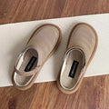 Women's beige linen slip-on shoes with mesh lining, round toe, and rubber sole on a neutral background.